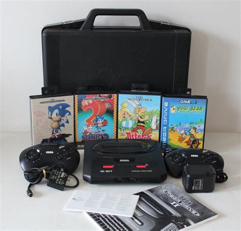Sega Mega Drive 2 compleet in koffer met 4 spellen - Catawiki