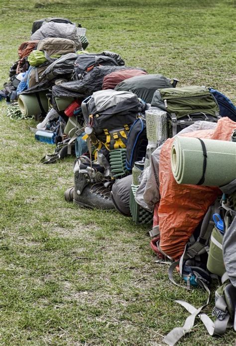 Row Of Backpacking Packs Ready For The Chilkoot Trail Stock Photo