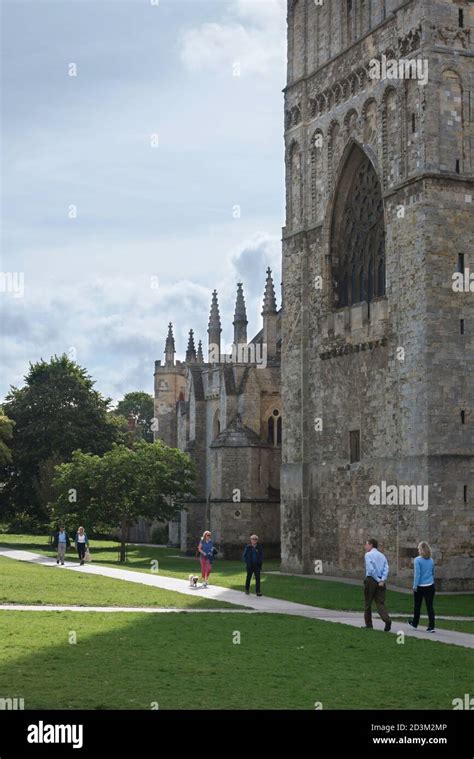 Exeter Cathedral Close View In Summer Of People Walking In The