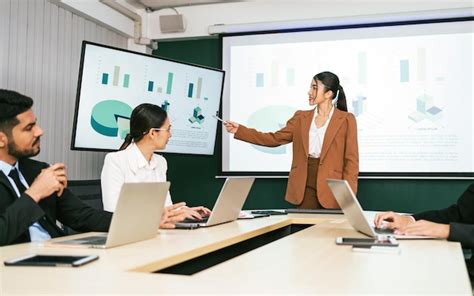 Premium Photo A Cheerful And Confident Asian Businesswoman Stands