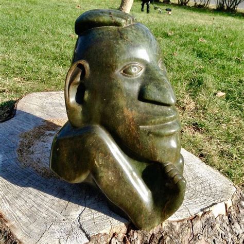 SIGNED FIRST GENERATION SERPENTINE SHONA SCULPTURE BY KNOWN ARTIST