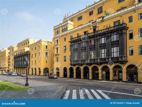 Colonial Yellow Building With Balconies In Downtown Lima City Near