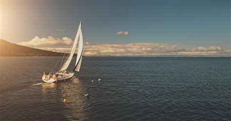 Premium Photo Sun Over Sailing Regatta On Luxury Yachts Aerial