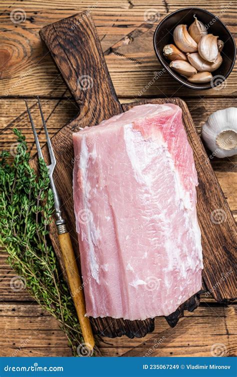 Raw Pork Loin With Spices On Wooden Board Wooden Background Stock