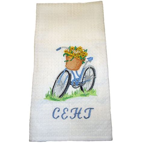 The Embroidered Towel Has A Bicycle With Flowers In It And Reads Cshjt