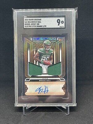 Obsidian Breece Hall Rookie Jersey Ink Electric Etch Orange Auto