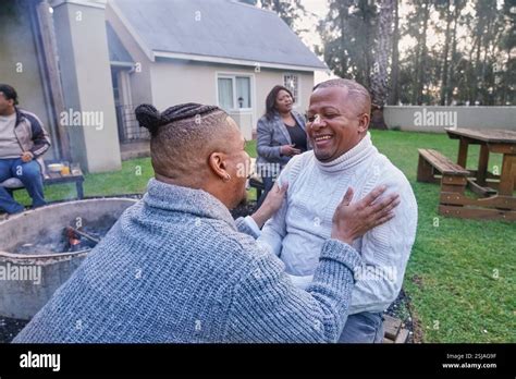 Gay Couple Flirting In Back Yard Stock Photo Alamy