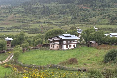 The Wooden Fencing Along The Path Around One Of The Farmhouse In Beteng