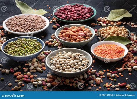 Legumes Assortment On A Black Background Lentils Soybeans Chickpeas