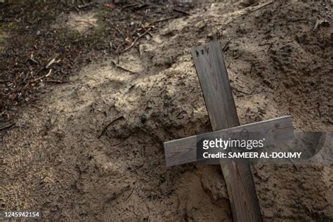 1,265 Mass Graves Exhumation Stock Photos, High-Res Pictures, and ...