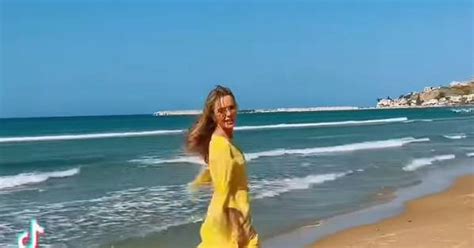 Amanda Holden S Ageless Figure Celebrated By Fans As She Frolics In Tiny Yellow Bikini On