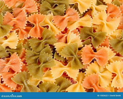 Dried Tri-colored Farfalle Pasta Stock Photo - Image of yummy, bowtie ...