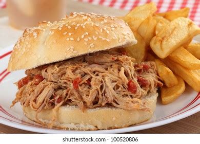 Closeup Pulled Pork Sandwich On Sesame Stock Photo 100520806 Shutterstock