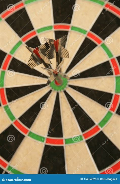 Three Darts In Bullseye Royalty Free Stock Photo - Image: 15264025