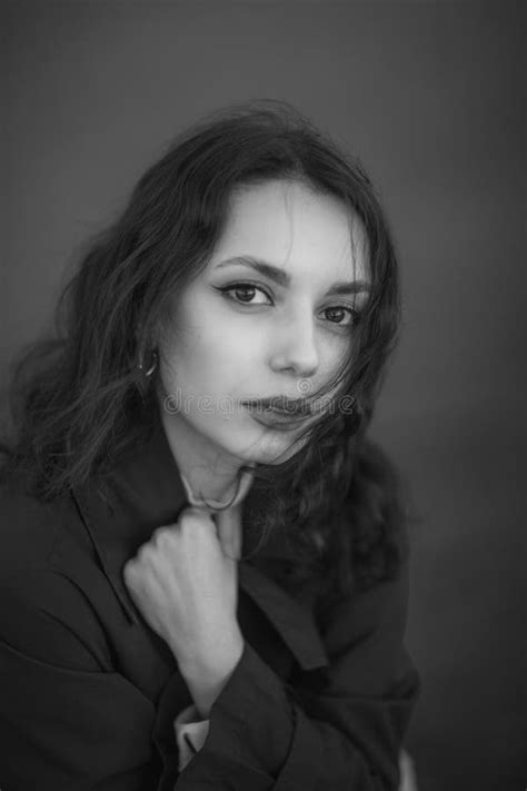 Beautiful Brunette European Girl In Blue Trench Coat At Nature Stock Photo Image Of Urban