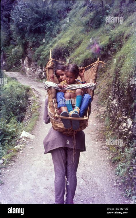 Lifting Children On Back Pack Himalaya Stock Photo Alamy