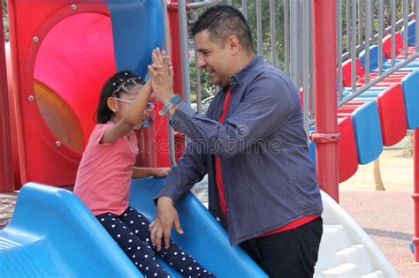 Divorced Dad With His Year Old Brunette Latina Daughter Play In The Park Games And Spend
