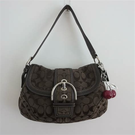 sold  coach brown monogram soho bag    shipping