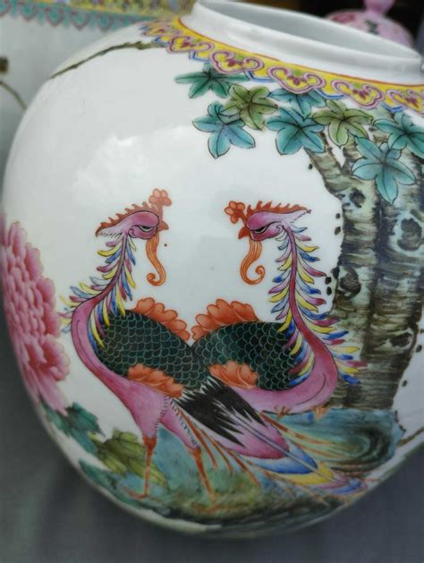 A Chinese famille rose jardinière a ginger jar and a vase and cover