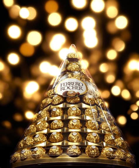 Ferrero Rocher= Lets be honest that pyramid wouldn't even last me a ...