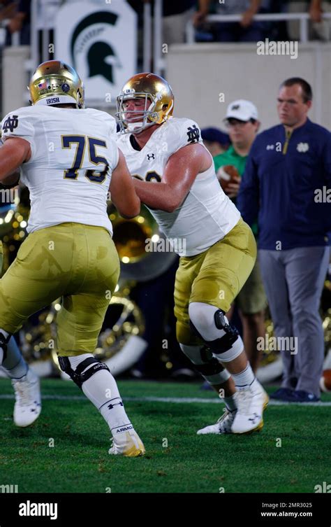 Notre Dame Offensive Lineman Mike Mcglinchey Warms Up Before An Ncaa