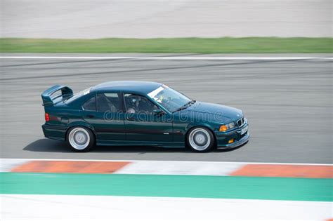 Dark Green Bmw E36 Driving Fast On A Competition Track Editorial Image