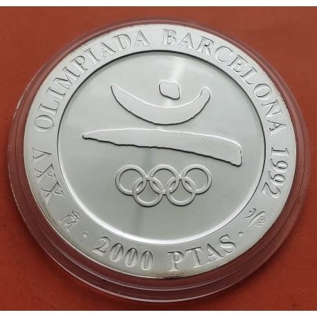 1 MONEDA CÁPSULA x España 2000 PESETAS 1990 EMBLEMA OFICIAL OLIMPIADA