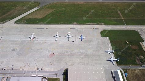 Premium Photo | Airport with airplanes aerial view