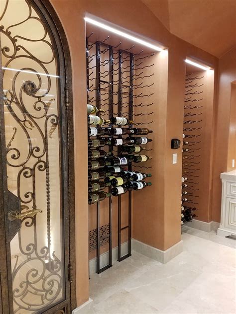 A Stunning Floor To Ceiling Metal Wine Rack Display In Irvine