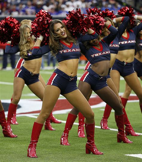 Texans Pup hangs with Houston Texans cheerleaders on National Dog Day