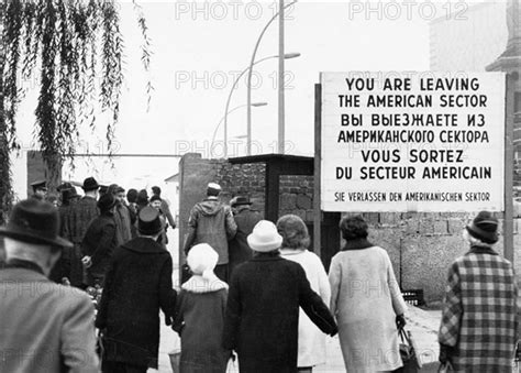 West Berliners Crossing Over At The Oberbaum Checkpoint To Visit