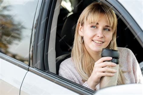 Free Photo Beautiful Blonde Woman Sitting In Car