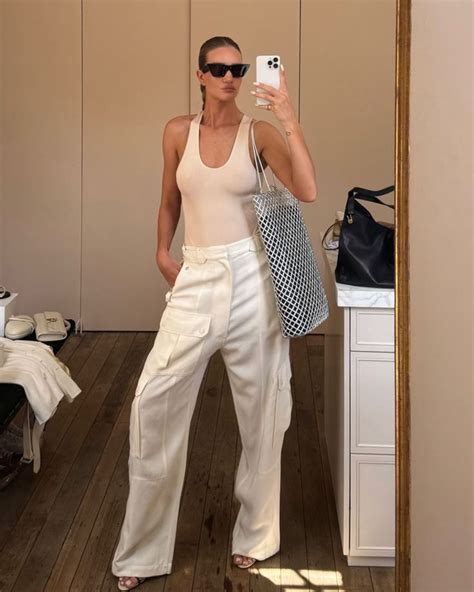 Rosiehw Kept It Simple And Fresh Yesterday With This Minimalist Combo Shes Wearing A Nude Top