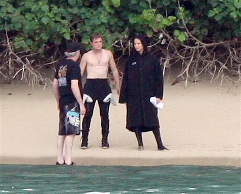 Jennifer Lawrence & Shirtless Josh Hutcherson: 'Catching Fire' Sea ...