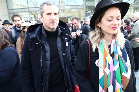 Photo Marion Cotillard et son compagnon Guillaume Canet à la sortie