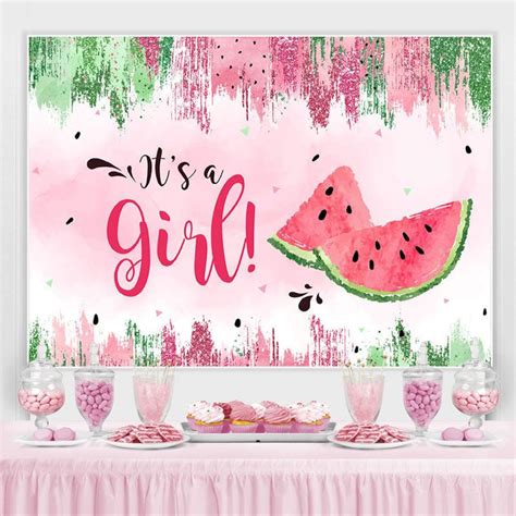 A Watermelon Party With Pink And Green Decorations