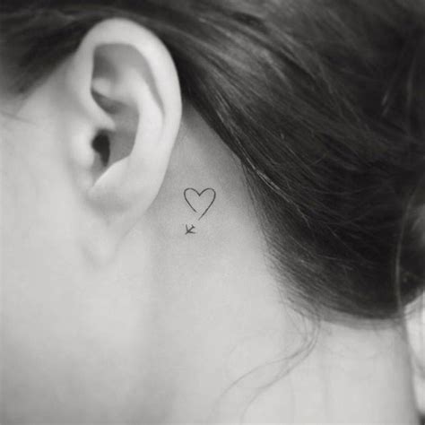 Minimalist Behind Ear Tattoo Heart And Airplane