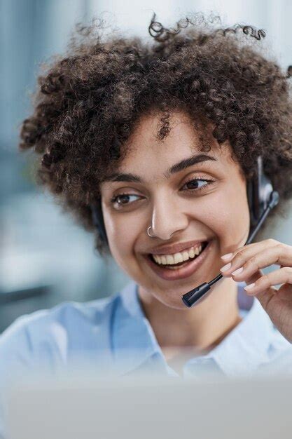 Premium Photo Girl In A Modern Office Working In A Call Center Smiling