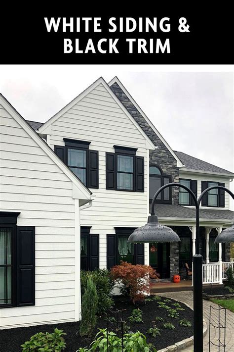 White Siding with Black Trim