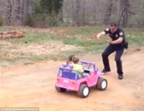 Adorable Moment Police Officer Dad Pulls Over His Kids In Toy Car For