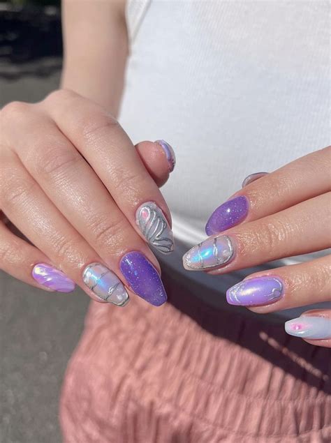 Are You Ready To Dive Into A World Of Stunning Purple Nail Designs We