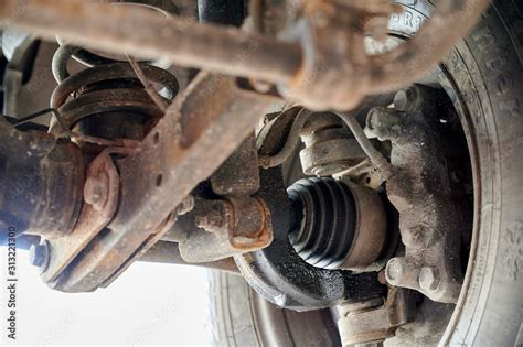 Car repair at a service station. Photo of spare parts and technical units. Stock Photo | Adobe Stock