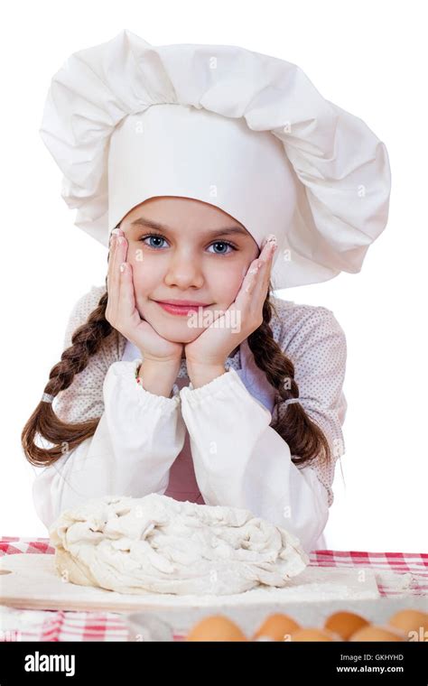 Portrait Dune Petite Fille Dans Un Tablier Blanc Et Chefs Hat Pétrir