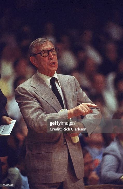 NCAA semifinals, UCLA coach John Wooden during game vs Louisville ...