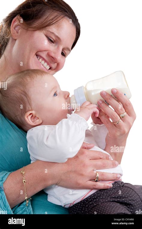 Mother Feeding Her Baby Milk With A Bottle Stock Photo Alamy