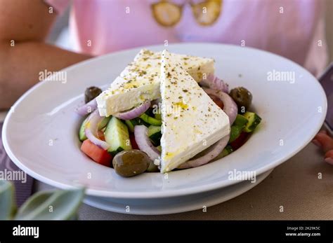 Greek salad with feta cheese Stock Photo - Alamy