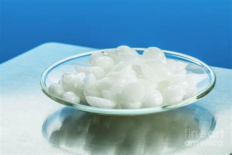 Sodium Hydroxide Pellets On Watch Glass Photograph By Martyn F Chillmaid Science Photo Library