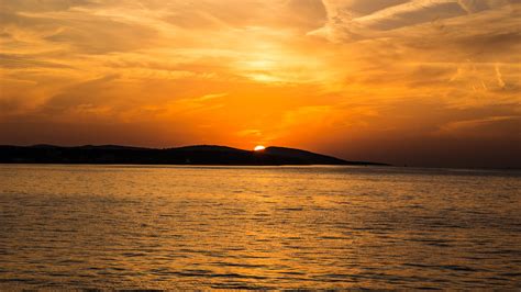 2560x1440 Sunset Island Mountains Sea 1440P Resolution HD 4k Wallpapers ...