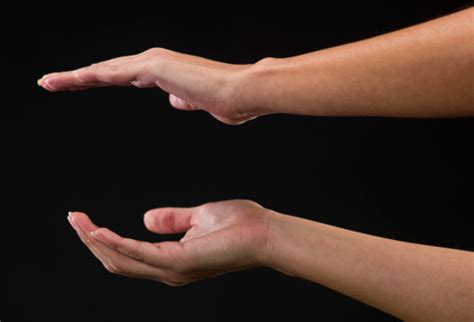 Two Woman Hands Holding An Object Stock Photo Download Image Now Istock