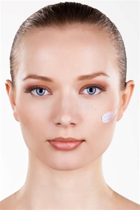 Charming Girl With Moisturizing Lotion On Her Cheek Nude Lips Natural Makeup Stock Image